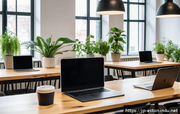 에스토니아 비자 신청 방법 - A modern co-working space in Tallinn, Estonia, filled with diverse digital nomads working on laptops...
